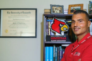 Loay wearing red helicopter shirt