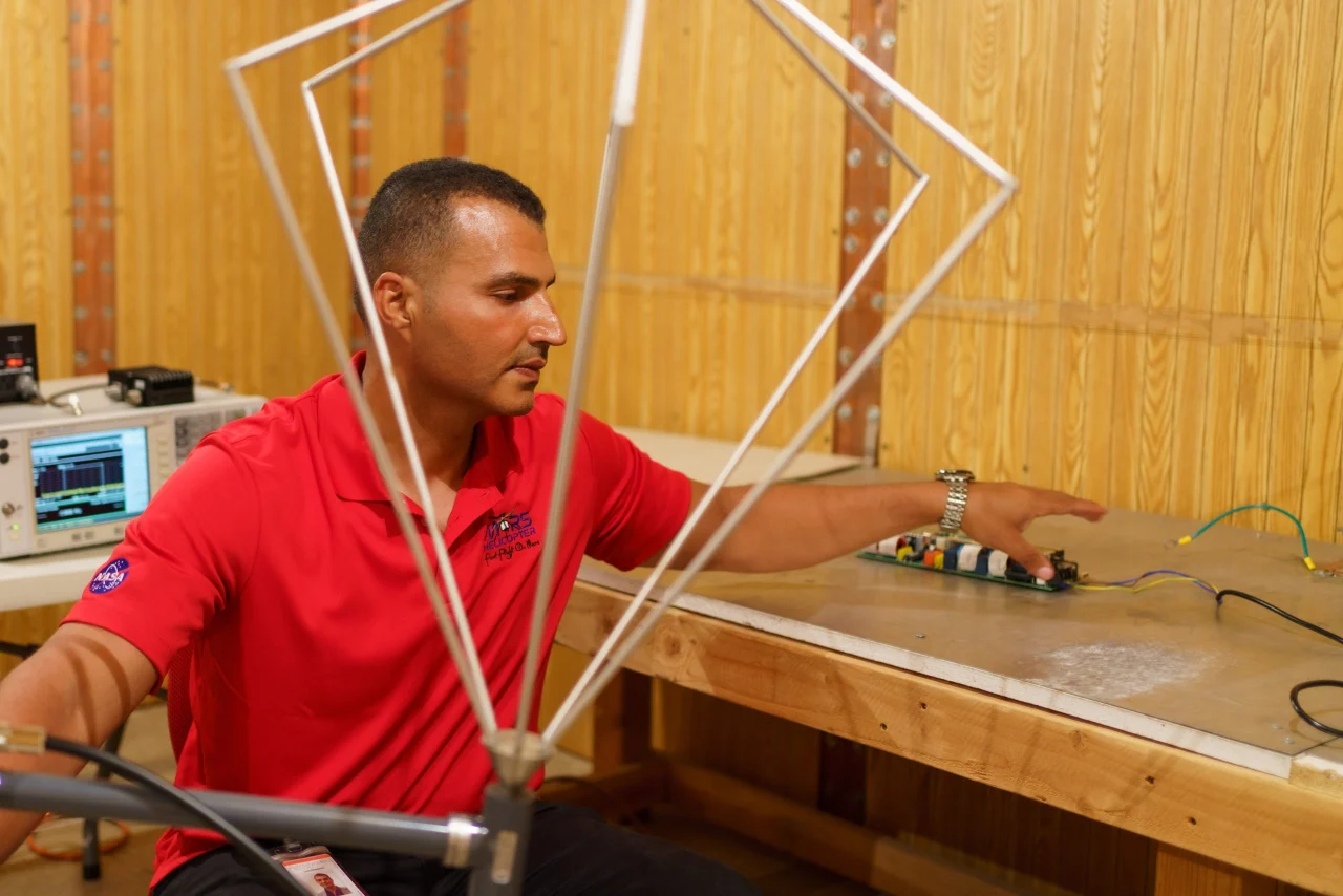 A closer look at Loay Elbasyouni and helicopter test hardware.